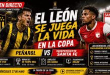 Santa Fe vence a Peñarol y clasifica a la Sudamericana Jugadores de Independiente Santa Fe disputando un balón en el torneo continental Copa Libertadores